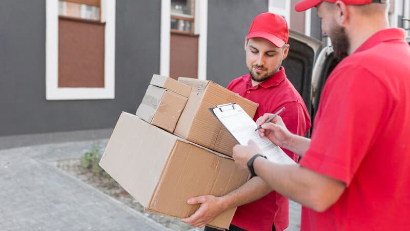Professional interstate Movers in Parramatta handling moving boxes and paperwork for a long-distance relocation